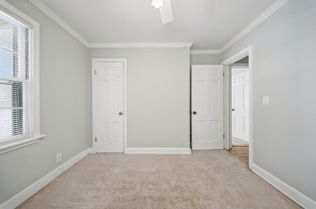 Building Photo - 4 Bedroom 2 Bathroom with large fenced in yard for Pets
