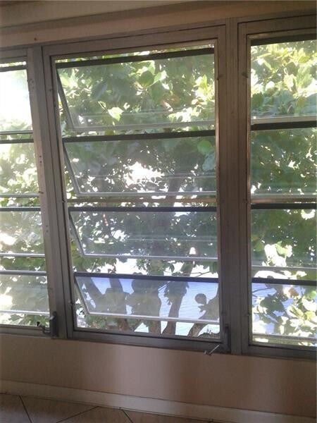 Building Photo - 5890 NW 64th Ave