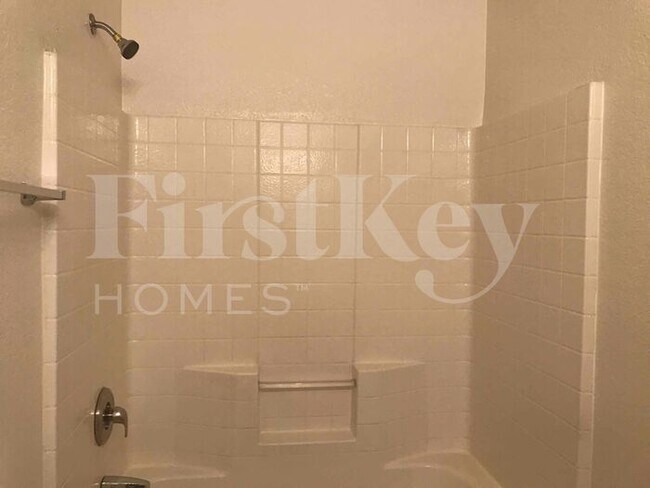 Building Photo - 8334 W Hughes Dr