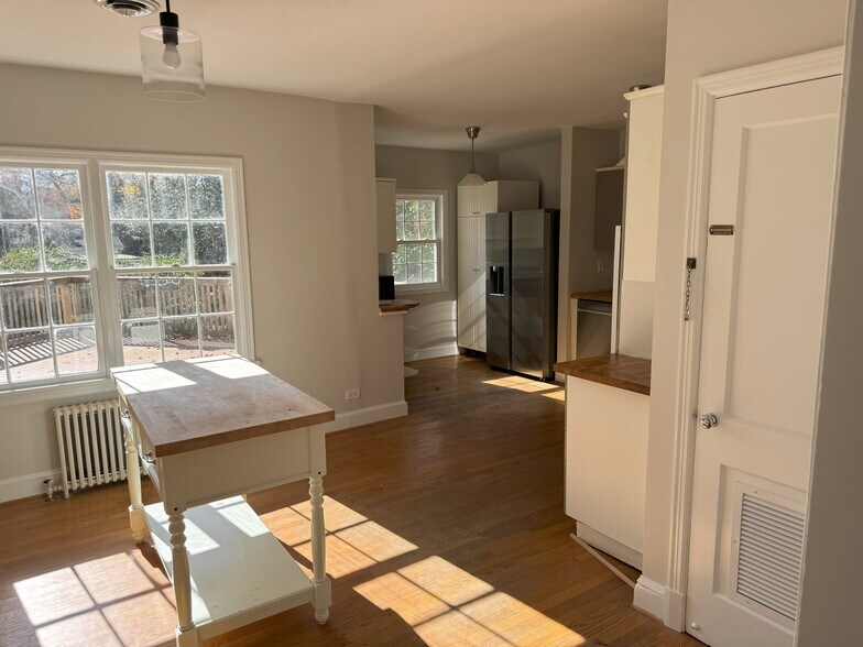 Living room into kitchen and dining - 302 Robertson Ave