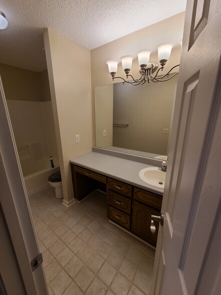 Attached master bathroom - 104 Bridgestone Dr NE