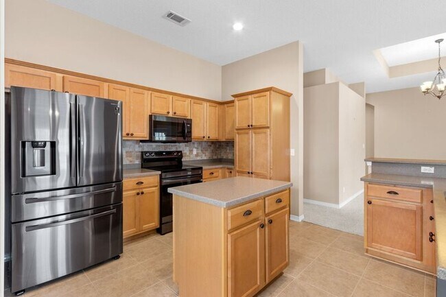 Building Photo - 5659 Tiger Woods Dr