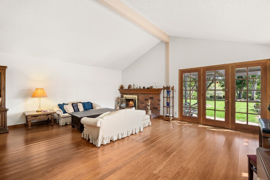 Large Living Room with Gas fireplace full hard wood floor and View - 1557 E Puente St