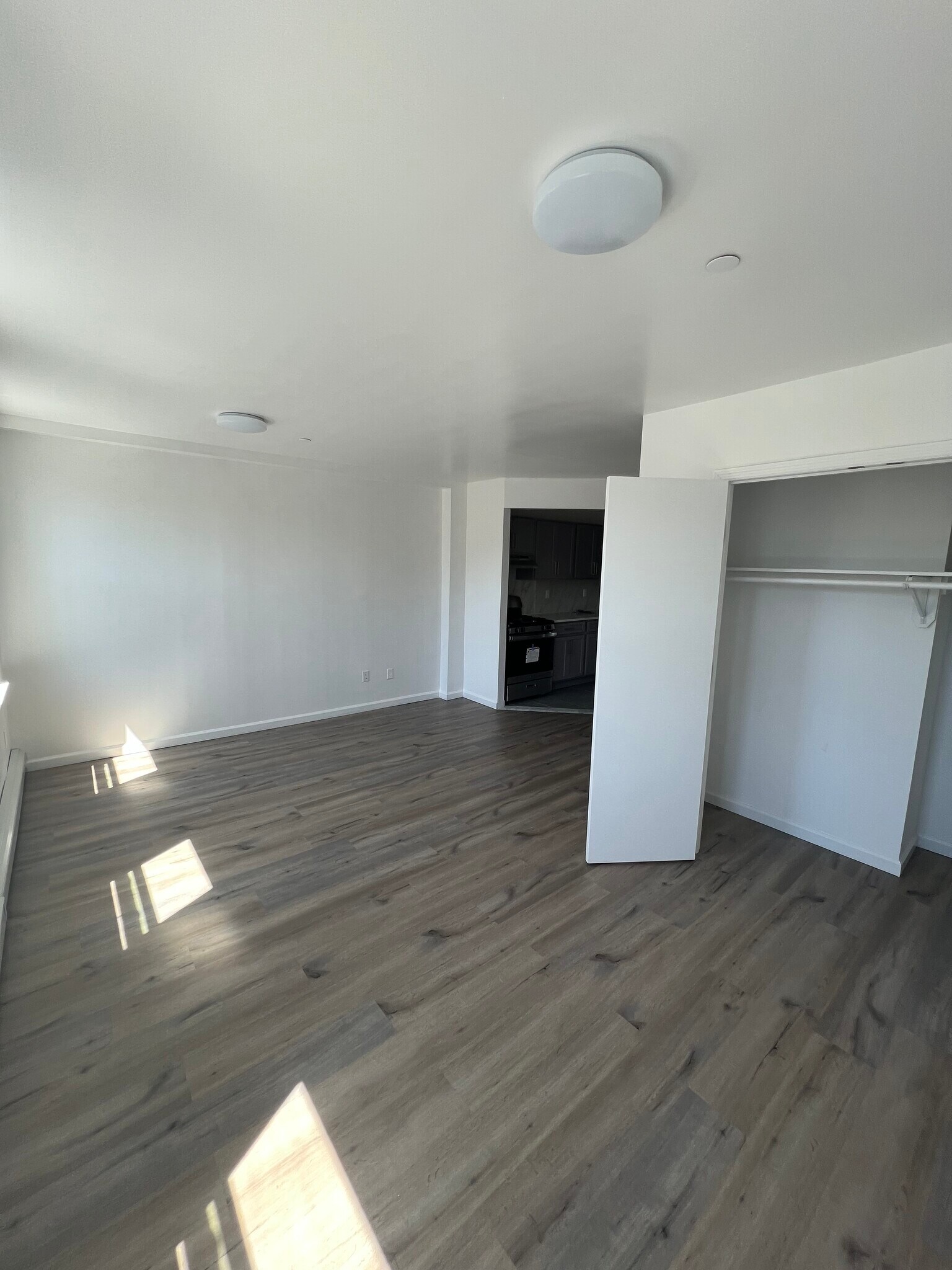 Open living/dining layout ideal for relaxing - 1835 Atlantic Ave
