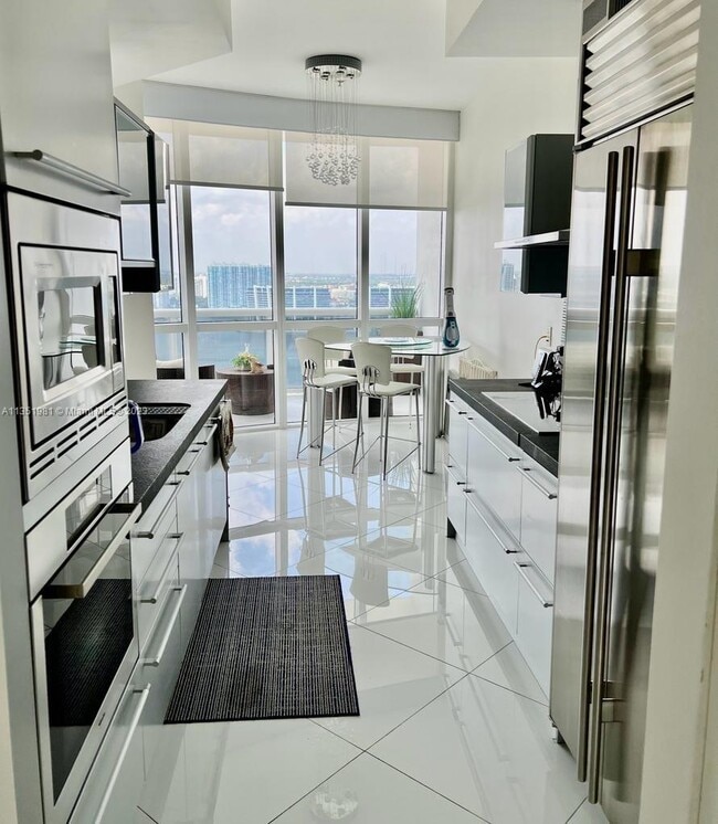 Building Photo - 18201 Collins Ave