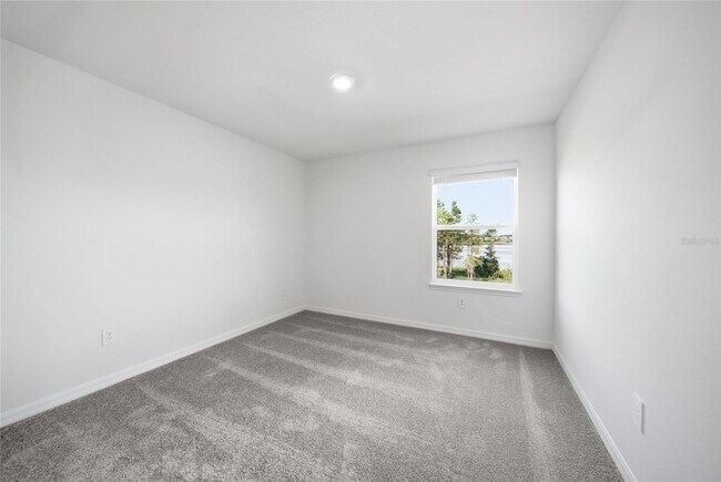 Building Photo - 8879 Coqui Song Ln