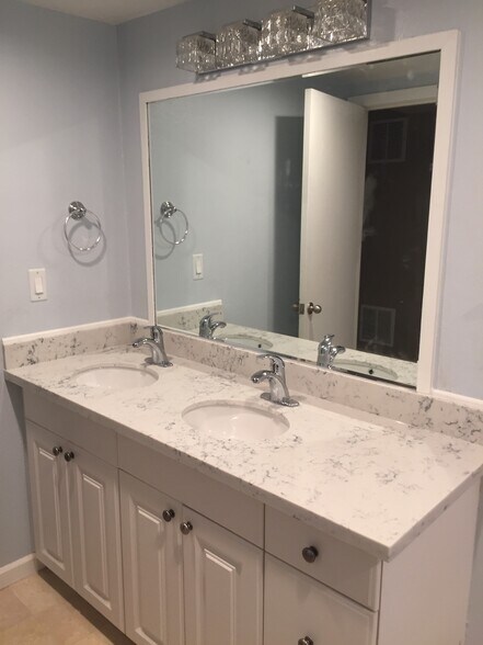 Bathroom with Double Vanity - 3913 Densmore Ave N