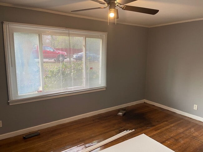 Building Photo - 3bed house in the county! Central all electric hvac, laundry, yard and hardwoods.