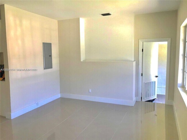 Building Photo - 6344 NW Miami Pl