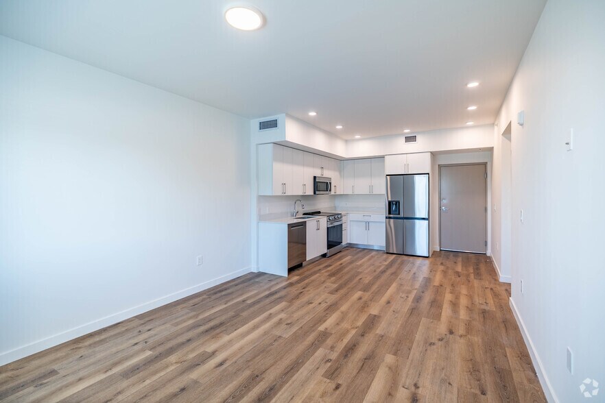 2BR, 2BA - 970SF - Living Room/Kitchen - Adrian Builders at Eureka