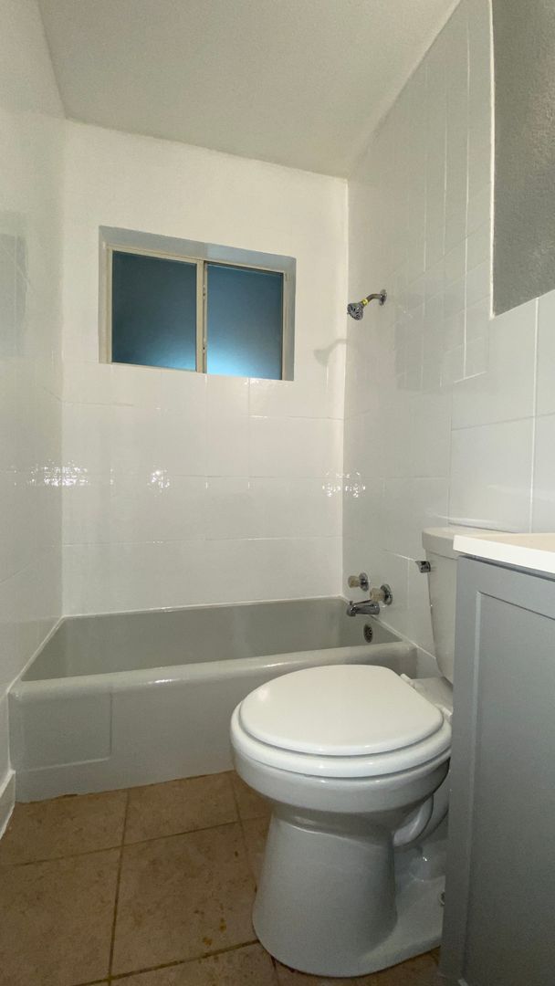 Building Photo - Freshly Painted and Ready for Immediate Move In