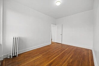 Building Photo - Welcome home to this sun-drenched 1-bedroom in the heart of Jackson Heights !