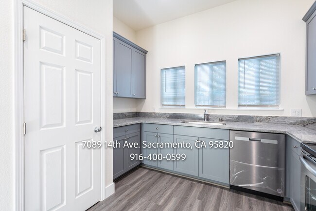 Building Photo - 7089 14th Ave