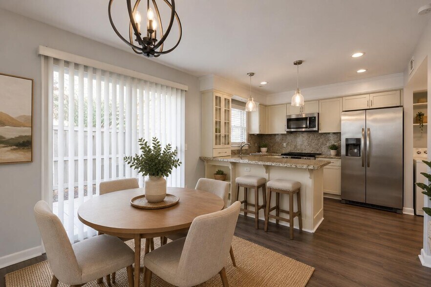 Open-concept dining area conveniently connected to the kitchen, creating a functional and welcoming - 3000 Hillsboro Pike