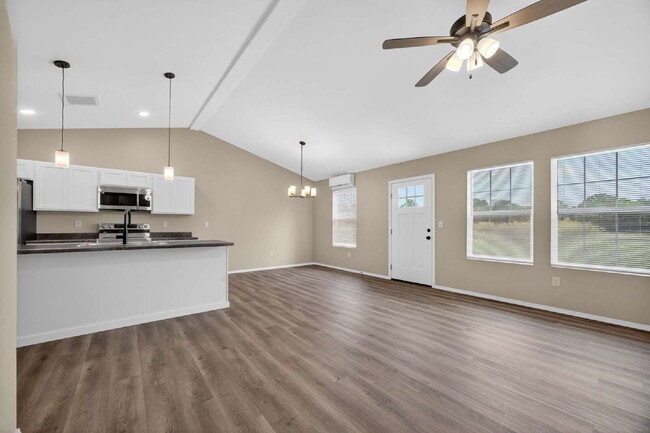 Building Photo - BRAND-NEW 4BR/2BA Duplex/Patio home with Garage - Available Now near Hollister, Schools