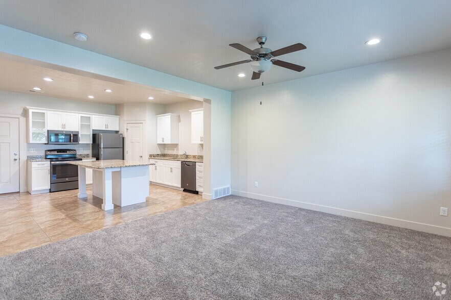 3BR, 2.5BA - 1,557SF - Living Room - The Cove at Pleasant View