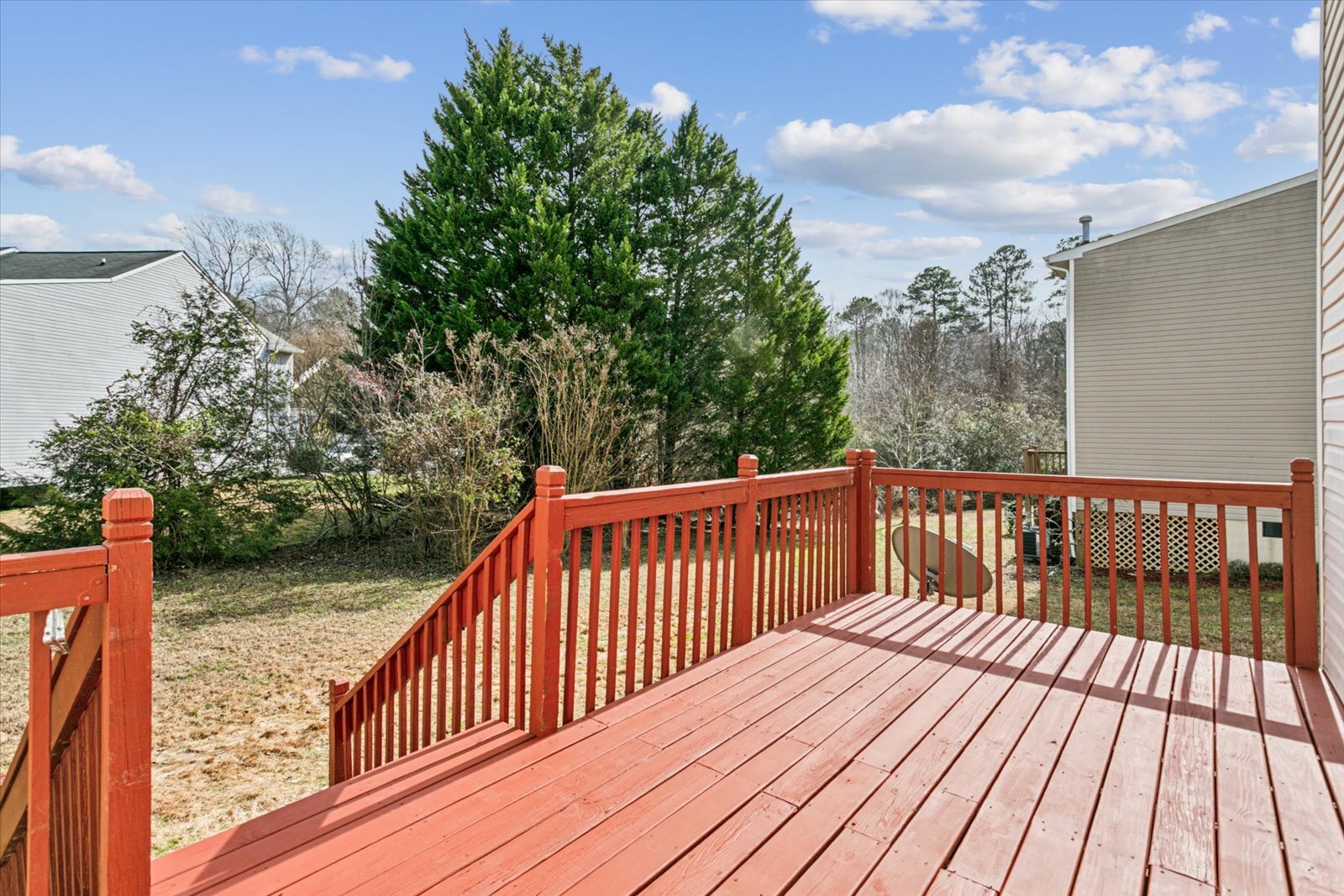 Spacious backdeck overlooks the backyard & common area. - 5369 Gardner Ct