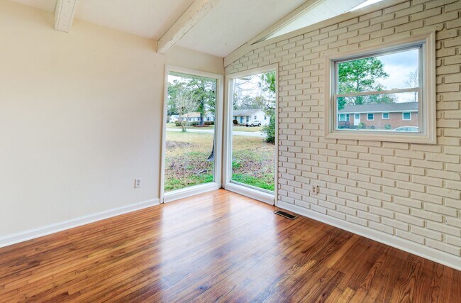 Building Photo - Mid-Century with character Available in July!