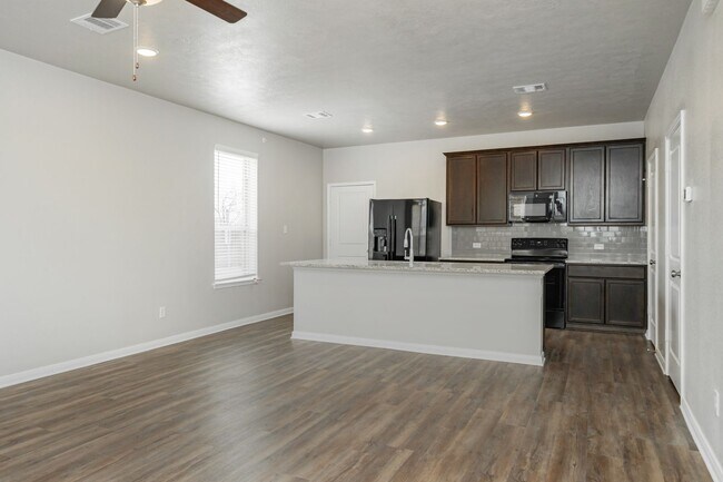 Building Photo - Spacious Townhome Available Now!
