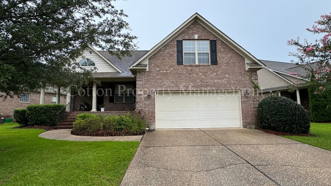 Building Photo - 4BR/3BA Well appointed home in the gated c...