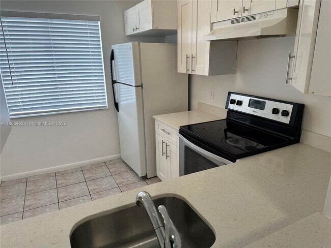 Building Photo - 8540 N Sherman Cir