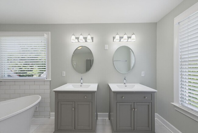 Building Photo - Southern Charm Meets Everyday Entertainment and Convenience!