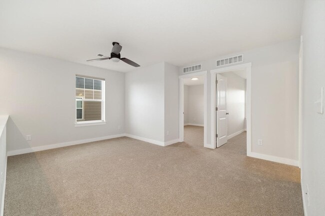 Building Photo - Outstanding Townhome W/ Large 3 Bed- 2.5 Bath and 2-Car Garage!