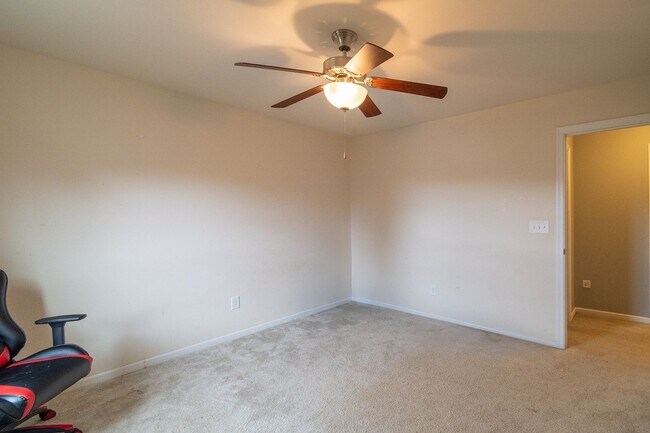 Building Photo - Spacious 4-Bedroom Home with Sunroom, Deck...