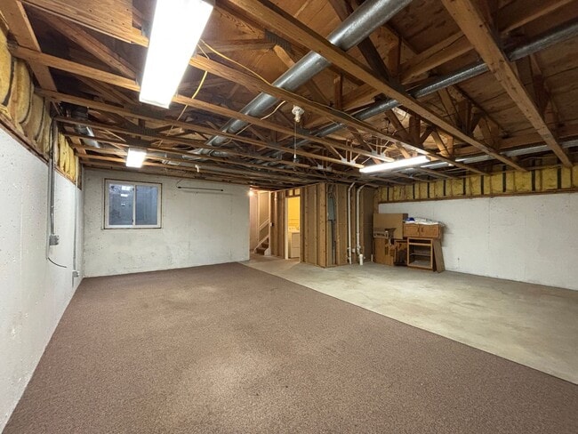 Building Photo - Large 3 bedroom, 2.5 bath townhome with 2-car garage!