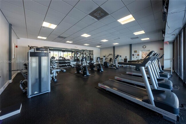 Building Photo - 3675 N Country Club Dr