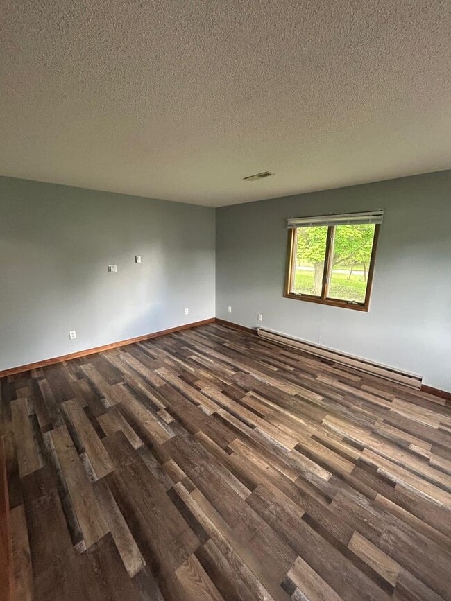 Building Photo - Updated 2BR, 1BA Brick Unit with Garage in...