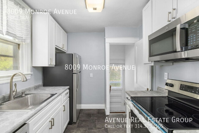 Building Photo - 8009 Monroe Ave