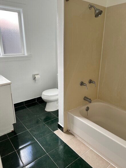 Bathroom with tub - 1329 Rose St