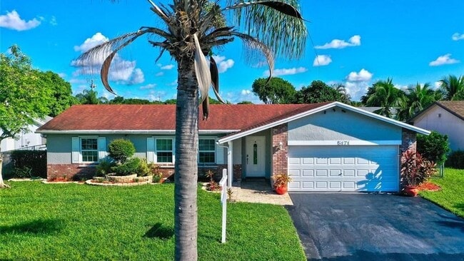 Building Photo - 3655 Cocoplum Cir