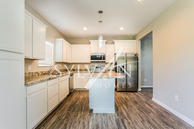 Building Photo - Turn the key. Enter. Smile. Repeat every day!