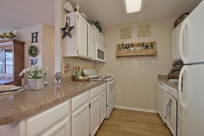 Building Photo - 2 Bed | 2 Bath 1,100 Sq. Ft. Two Car Garag...