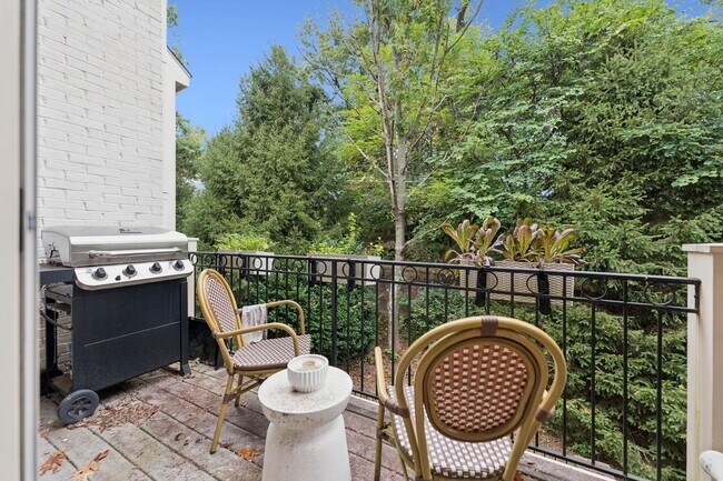 Building Photo - Discover this stunning four-level townhous...