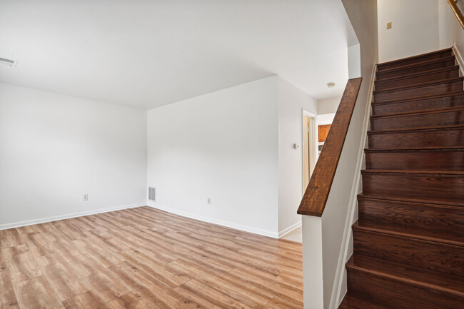 Living Room sports luxury vinyl flooring - 8407 Alameda Ct