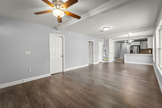 Building Photo - Home Sweet Home with Fire Pit & Modern Tou...