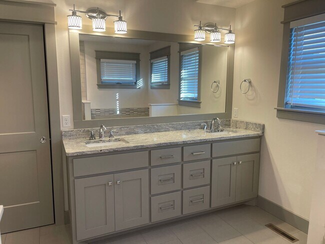 Building Photo - All Brick, 3 bedrooms AND 3 car garage