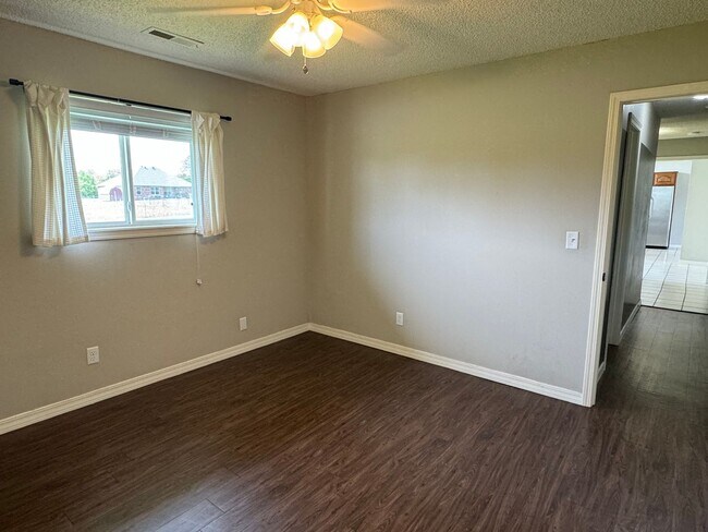 Building Photo - Available July 2025! 4-Bedroom, 2-Bathroom...