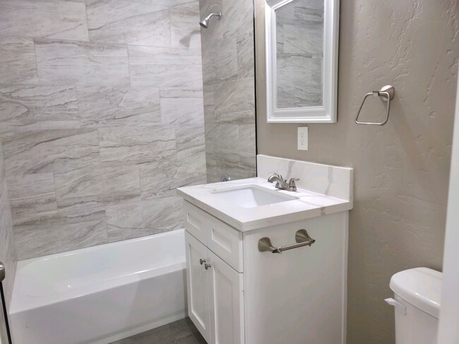 Building Photo - READY NOW! Newly Renovated! 4 Bdrm + Large Fenced Yard