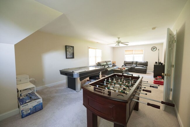 Building Photo - Spacious & Striking 3-story brick Executive 4 bedroom 4.5 bathroom home in Oak Ridge NC + Lawn ca...