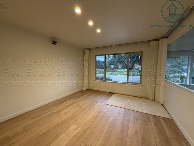 Building Photo - Beautifully Updated Three Bed (+ Bonus) Quail Lodge Home