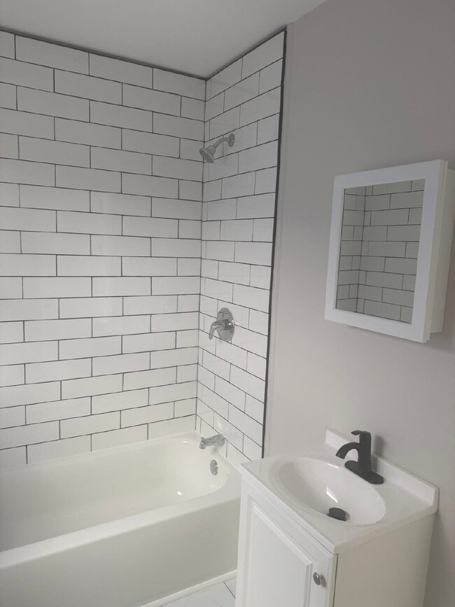 Building Photo - "Charming 4-Bedroom Townhouse in Trenton – Ideal Urban Living on MLK Jr. Blvd!"