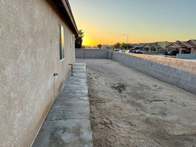 Building Photo - 4 Bedroom 2 Bath Corner Lot Home