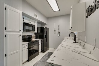 Building Photo - Stylish Fully Furnished 1BR Condo with Private Patio & Custom Closet