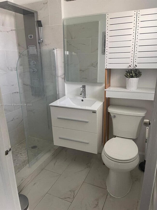 Building Photo - 6498 Collins Ave