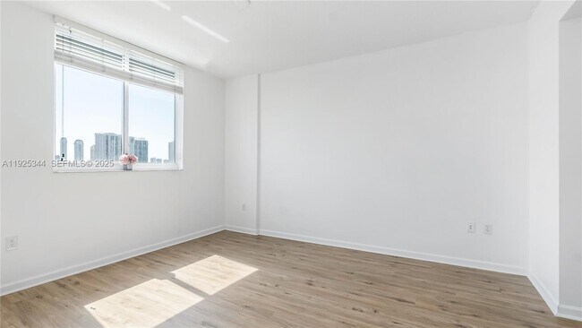 Building Photo - 18800 NE 29th Ave