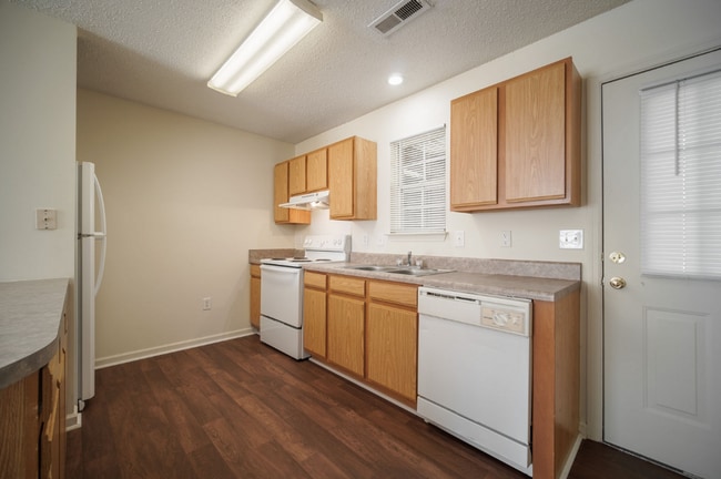 Building Photo - All Brick Building************Massive 2 Bedroom Villa************Single Level Villas